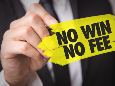 Person drawing on glass that reads no win no fee