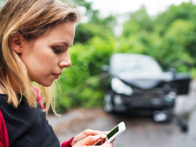 Women calling her attorney after car accident