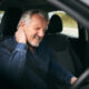 A man with a neck injury from a collision while driving a car in Florida.