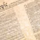The upper-left corner of the U.S. Constitution, focused on the words, "We the People."