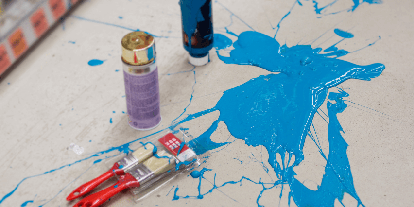 Paint spilled inside store, slip and fall hazard.